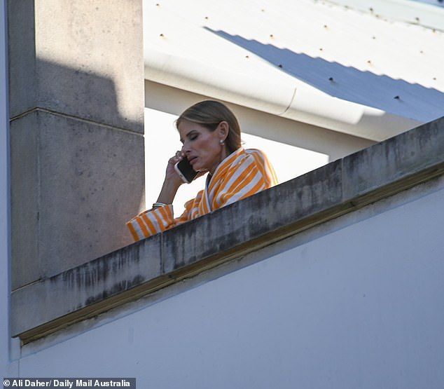 At one point, she paused to take a deep breath as if to compose herself