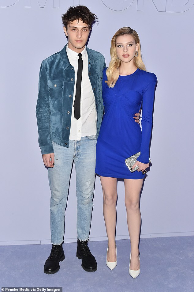 Sources indicate the root of the distance lies in Nicola¿s past relationship with Bella¿s brother, Anwar Hadid, which ended acrimoniously and fractured her ties with the wider Hadid family (pictured with Anwar in 2018)