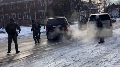 Footage shows woman fatally shot by ICE agent during Minnesota raid – video