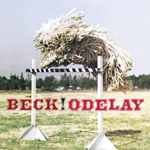 Cover of Beck’s Odelay featuring a shaggy dog mid-jump over a hurdle on a grassy field.