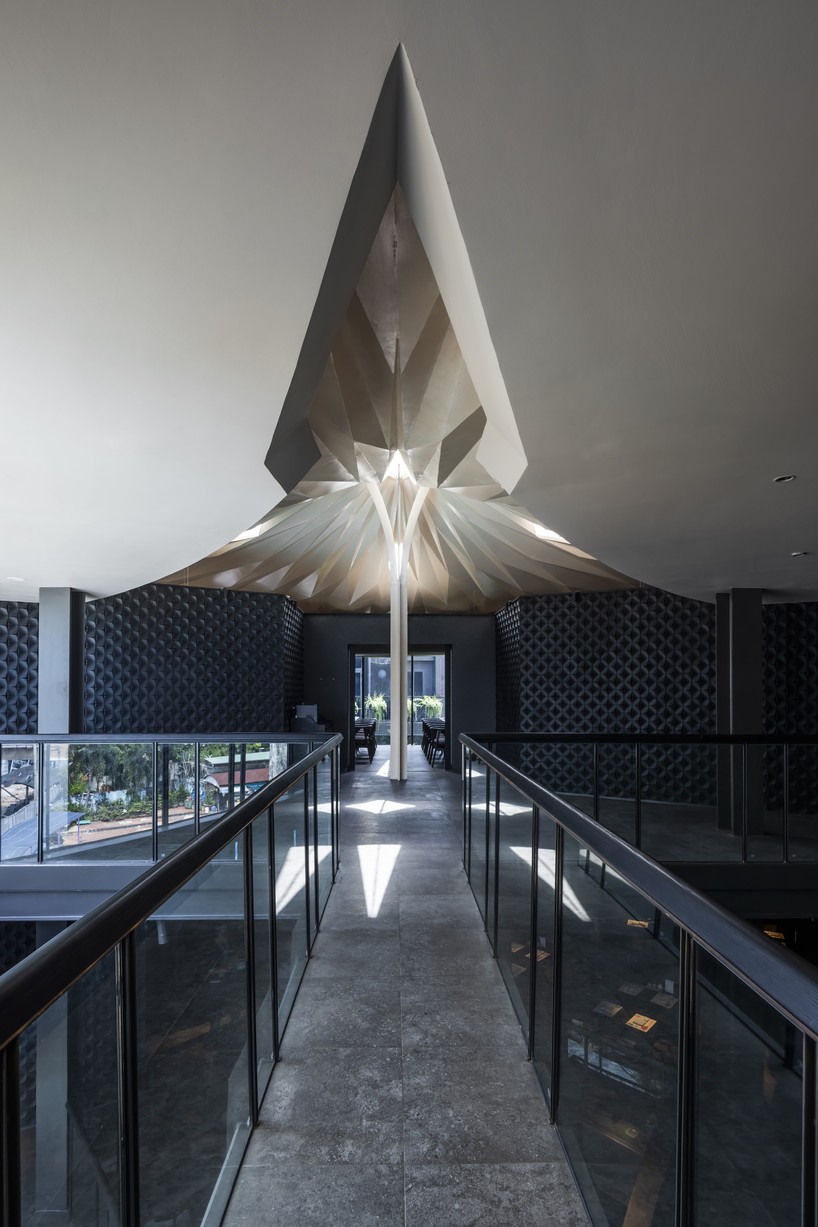 luminous origami-inspired steel roof by takashi niwa ornaments restaurant in vietnam