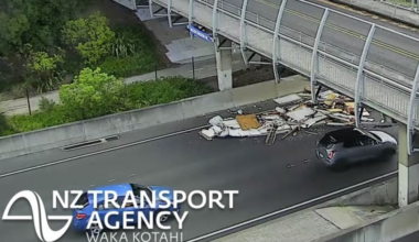 Truck carrying house ploughs into motorway overbridge