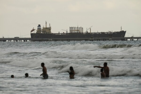 Evana, an oil tanker, is docked at El Palito Port in Puerto Cabello, Venezuela, Dec. 21, 2025. (AP Photo/Matias Delacroix, File)