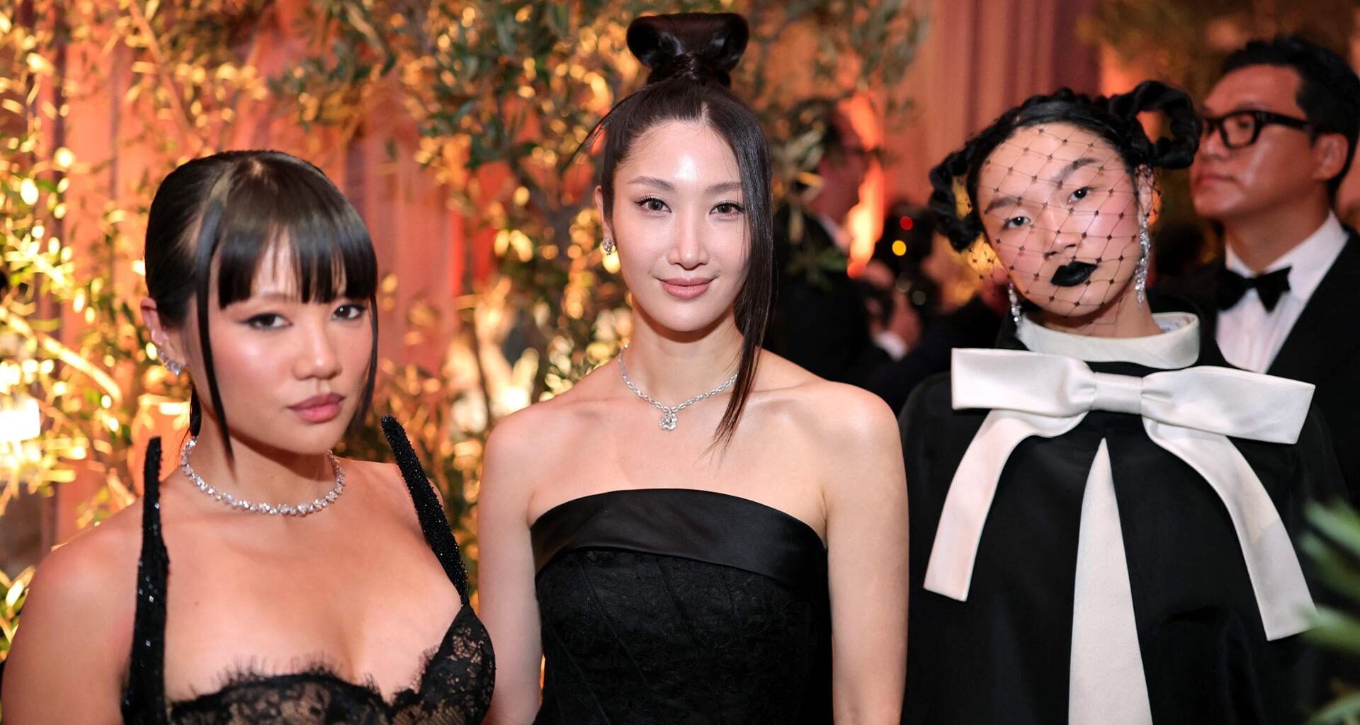 From left, Rei Ami, EJAE and Audrey Nuna attend the 83rd Golden Globe Awards at The Beverly Hilton in Beverly Hills, Calif., Sunday (local time). AFP-Yonhap