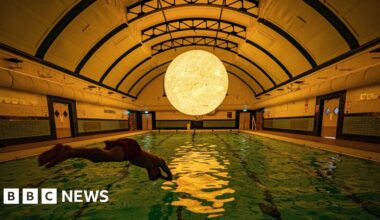 Luke Jerram's sun-inspired sculpture on display at Bristol pool