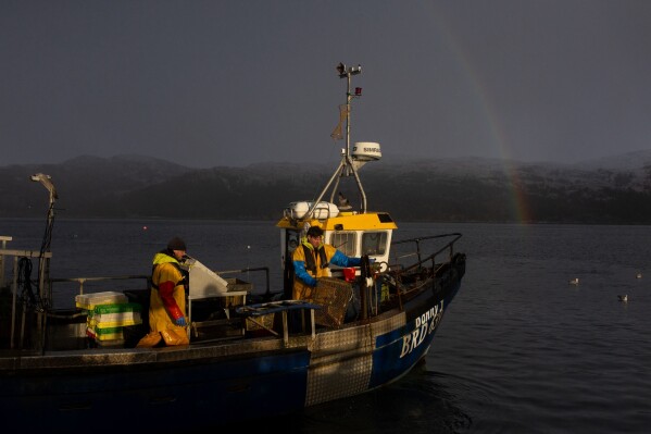 Small-scale creel fishermen operate in Loch Alsh next to the Isle of Skye on Nov. 20, 2025, in Scotland. (AP Photo/Emily Whitney)