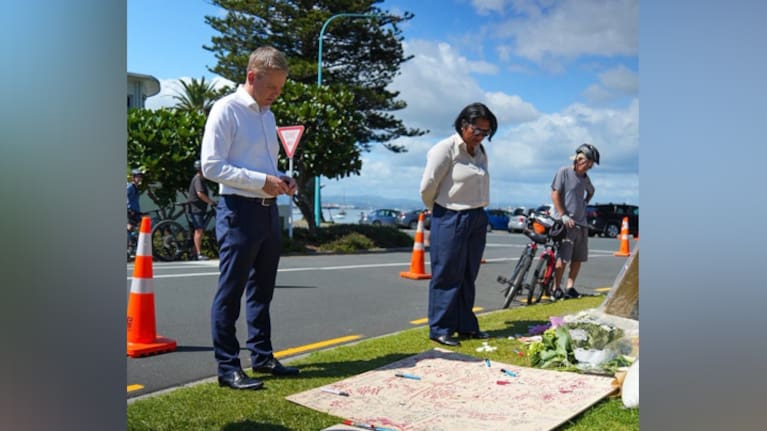 Labour leader Chris Hipkins reads messages left for the victims of the Tauranga landslides. (Source: Facebook)