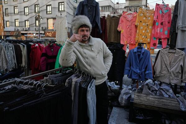 A vendor waits for customers at Tajrish Square in Tehran, Iran, Tuesday, Jan. 27, 2026. (AP Photo/Vahid Salemi, File)
