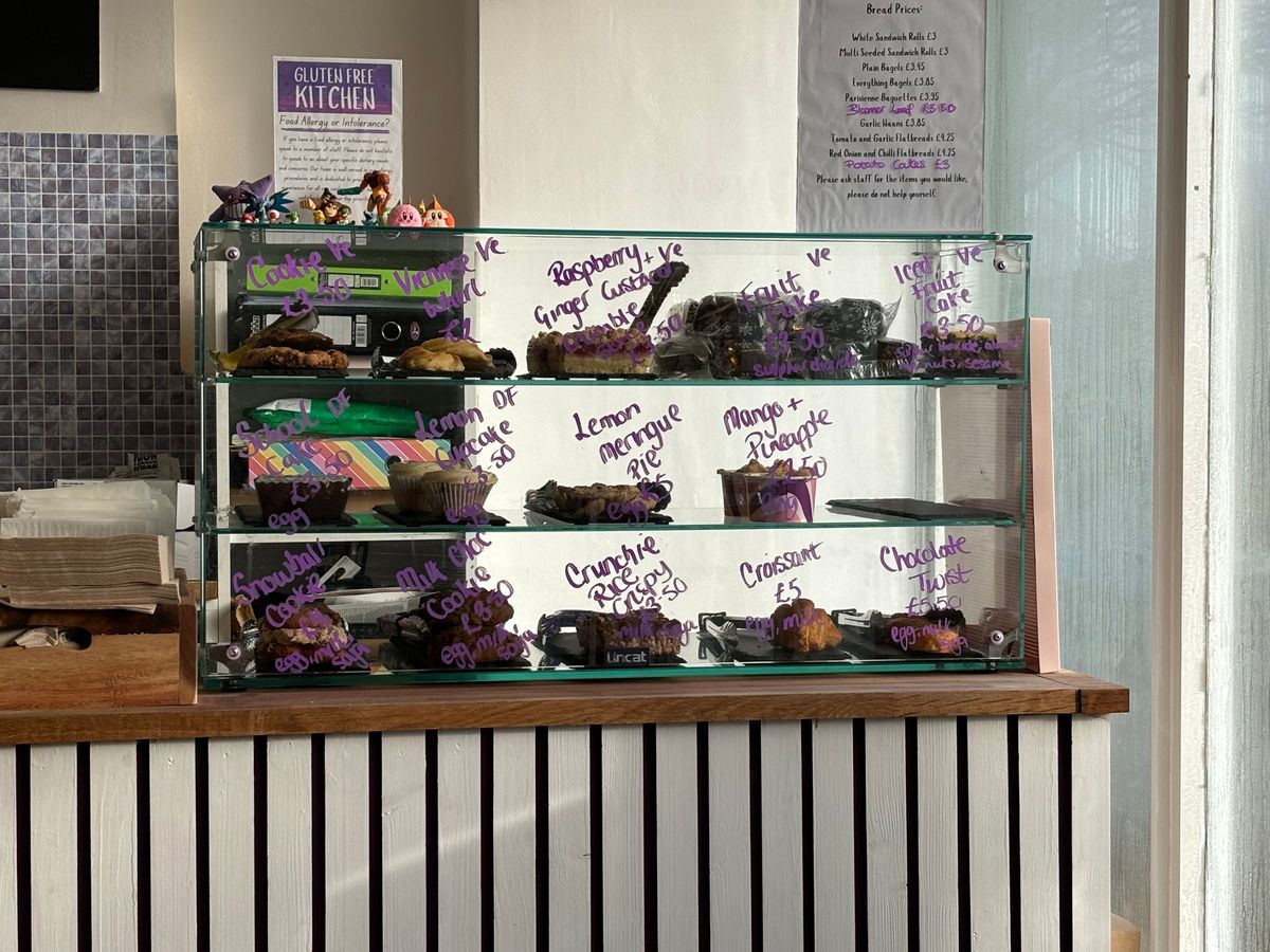 The kitchen sells a variety of cookies, croissants, cakes and pastries