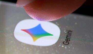 The Gemini app icon on a smartphone in this illustration