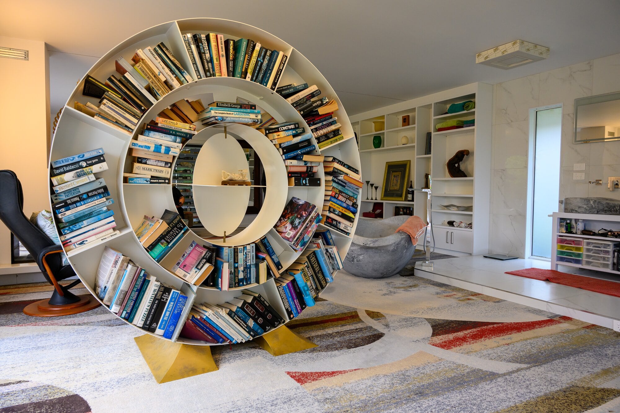 Jens Mueller had a circular bookcase built to hold some of his book collection. Photo / David Hall