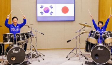 Japanese and South Korean leaders jam to K-pop hits at a summit