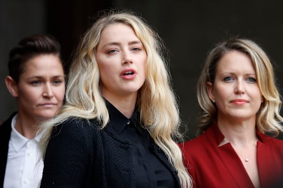 Robinson, right, with Amber Heard outside court in London in 2020.