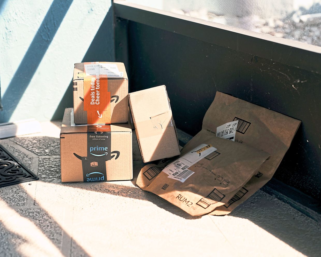 Newly arrived packages from Amazon outside Conti’s home.