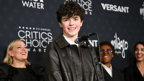 Getty Images Owen Cooper wins the Critics Choice Award for Best Limited Series Award for "Adolescence" at the 31st Annual Critics Choice Awards held at the Barker Hangar on January 04, 2026 in Santa Monica, California.