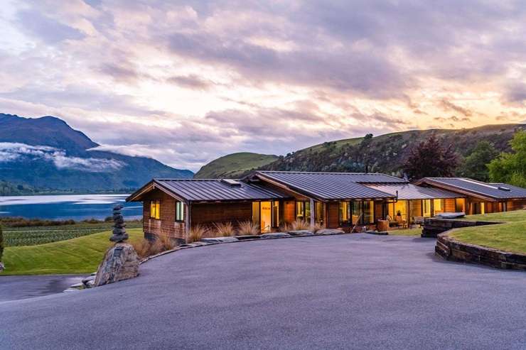 A picturesque five-bedroom designer home at 4 Fishermans Lane, in Mount Creighton, Queenstown, is up for grabs for $9.625m. Photo / Supplied