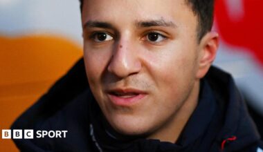 Close-up of Isack Hadjar's face and dark collar