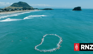 Surfers pay tribute to those killed in Mount Maunganui landslide