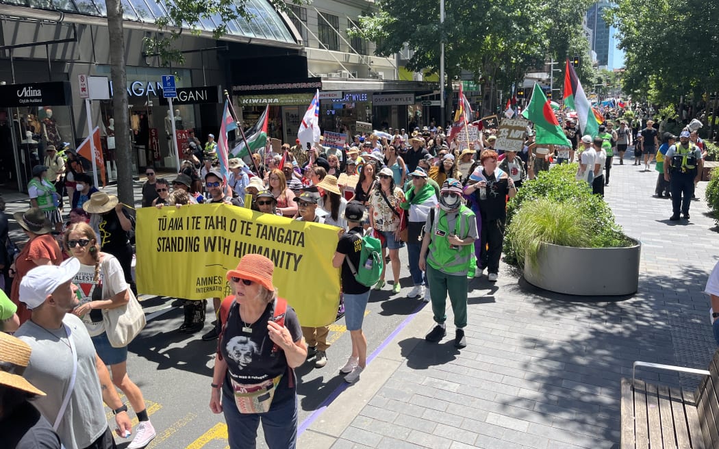 Hundreds marched in a peace rally organised by Toitu te Aroha in Auckland's CBD