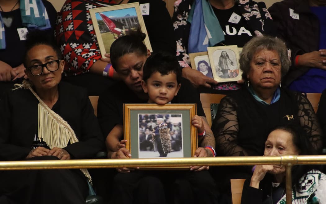 Ngāti Hāua iwi members witness the passing of their Treaty settlement into law.