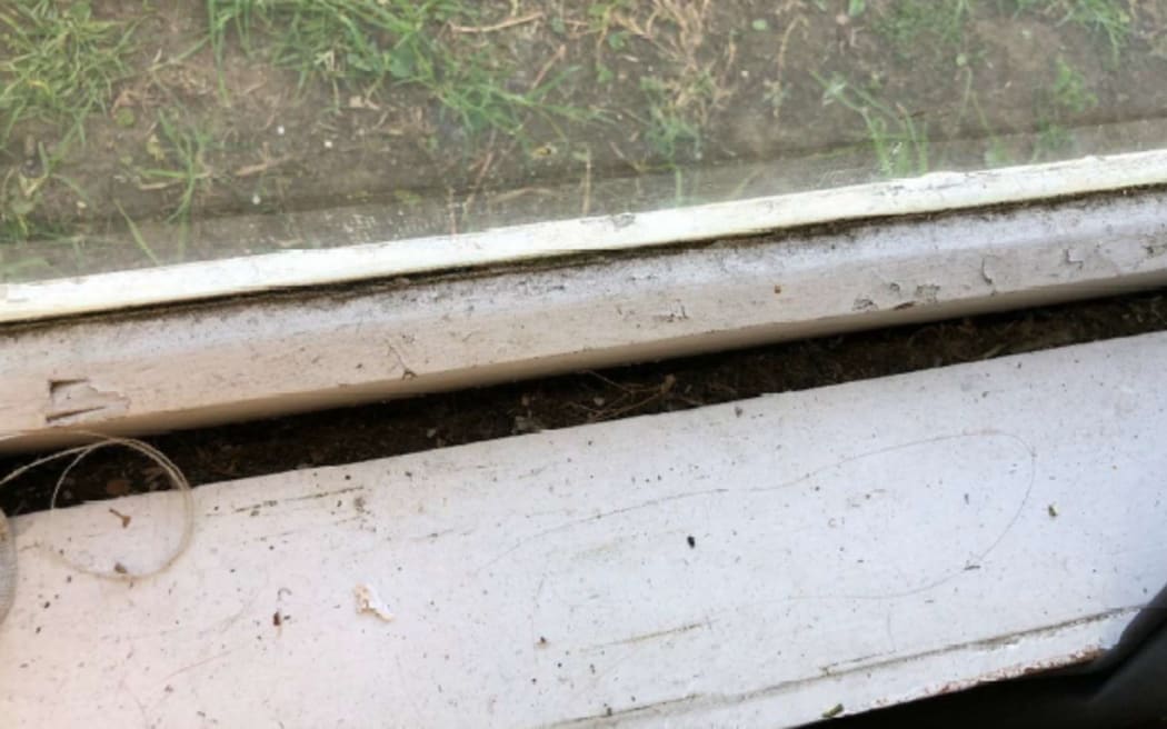 Gap in window frame.