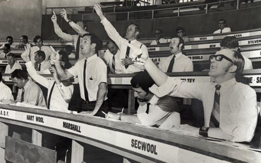 Buyers bidding at auction at the Napier Wool Exchange in the 1960s.