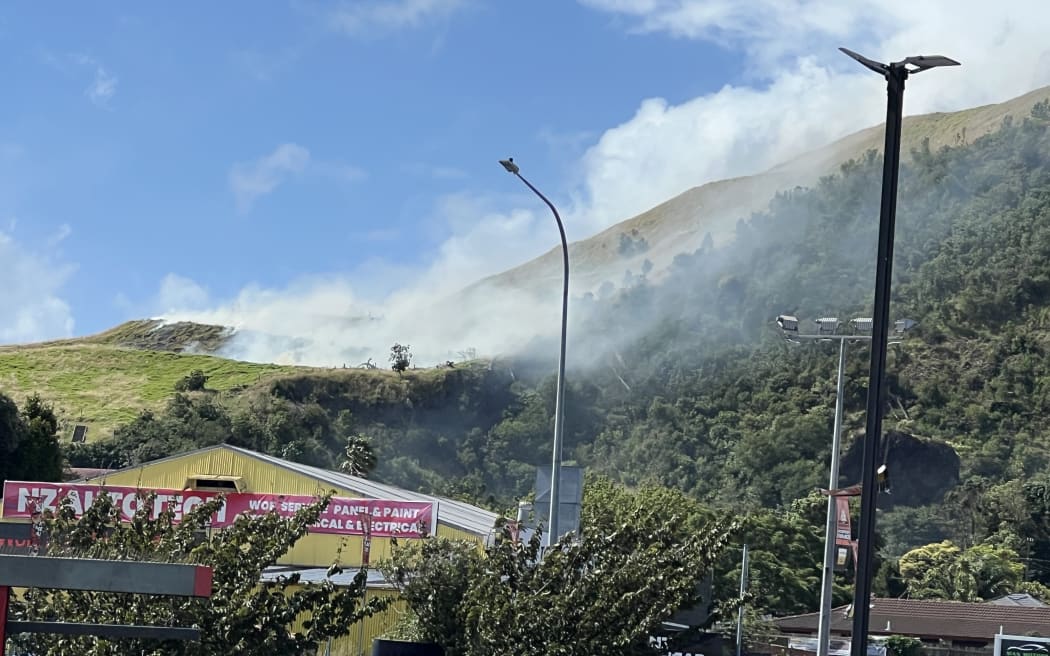 Smoke clouds rising off Mt Wellington maunga, in Auckland, on 25 January, 2026.