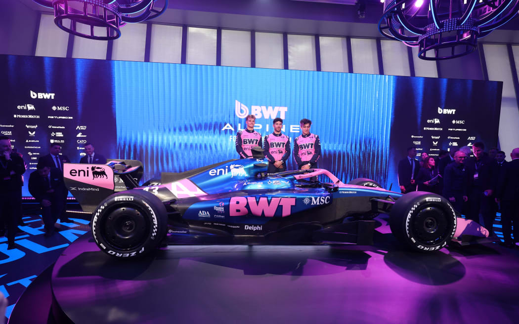 (From L) Alpine's Estonian test and reserve driver Paul Aron, Alpine's French driver Pierre Gasly and Alpine's Argentinian driver Franco Colapinto pose during the 2026 Alpine F1 season launch.
