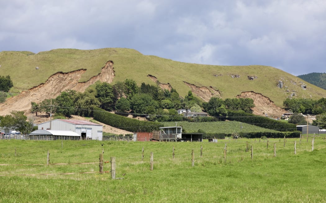 Damaged property from landslide at 1130 Welcome Bay from across a field outside of the cordon.