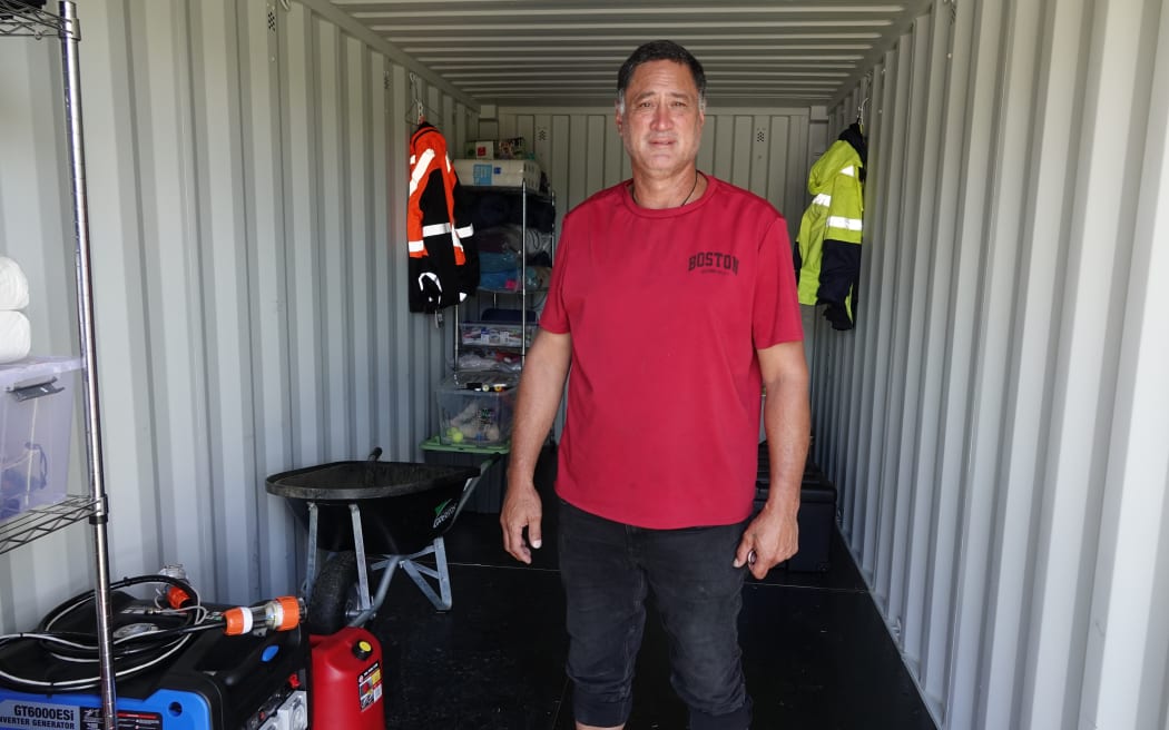 Paora Glassie checks a container stocked with emergency equipment at Ōtetao Reti Marae.