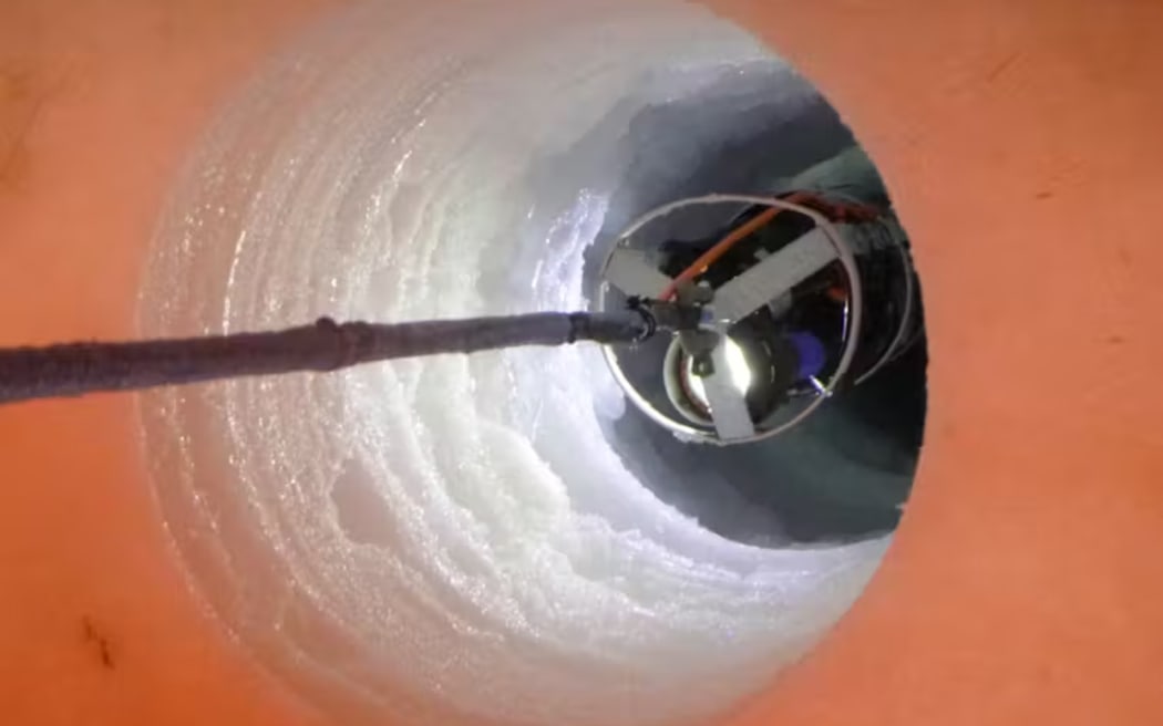 Instruments being lowered down the borehole. Stevens/NIWA/K061, CC BY-NC-ND