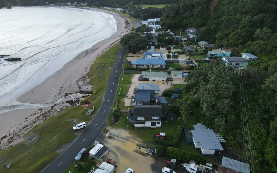 Floodwaters at Ōakura Bay as seen from the air.