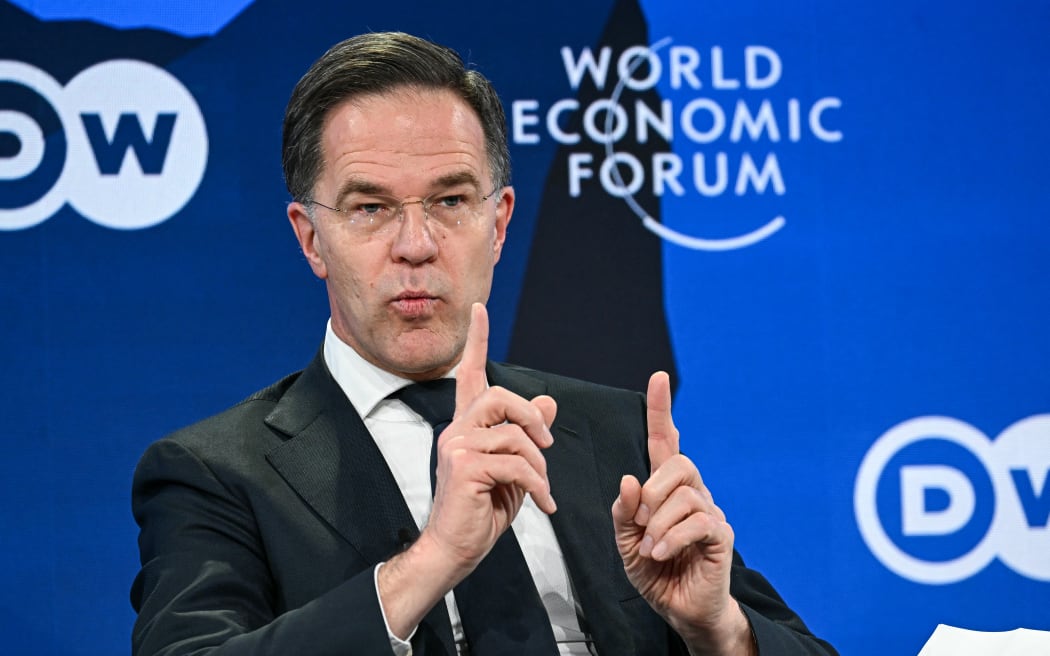 NATO Secretary General Mark Rutte gestures as he speaks during the World Economic Forum (WEF) annual meeting in Davos on January 21, 2026. The World Economic Forum takes place in Davos from January 19 to January 23, 2026. (Photo by Fabrice COFFRINI / AFP)