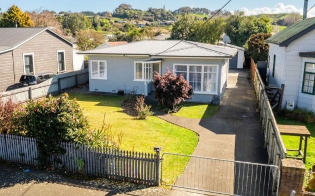 This three-bedroom house is listed at inquiries more than $479,000, just above the median for Whanganui first-home buyers.