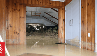 Weather live: Person swept away in river, floods close highways, red rain warnings