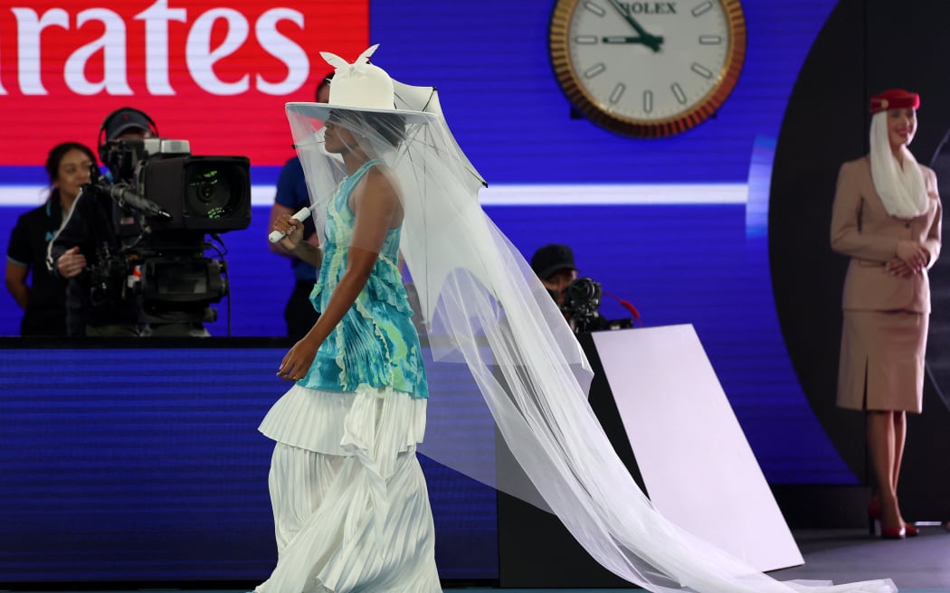 Japan's Naomi Osaka walks onto court, Australian Open, 2026.