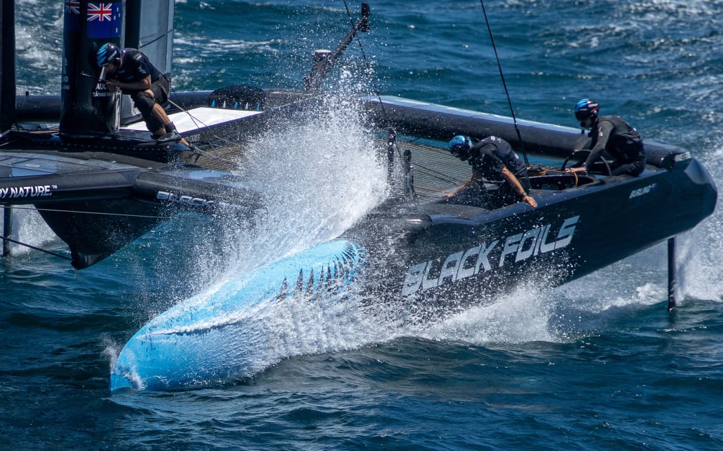 Black Foils SailGP Team helmed by Peter Burling crashes into the water during a practice session ahead of the Oracle Perth Sail Grand Prix presented by KPMG in Perth, Australia. Friday 16 January 2026. Rolex SailGP Championship Event 1 2026 Season. Photo: Samo Vidic for SailGP. Handout image supplied by SailGP