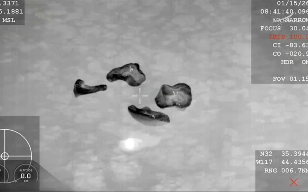 SpaceX Dragon capsule splashes down.