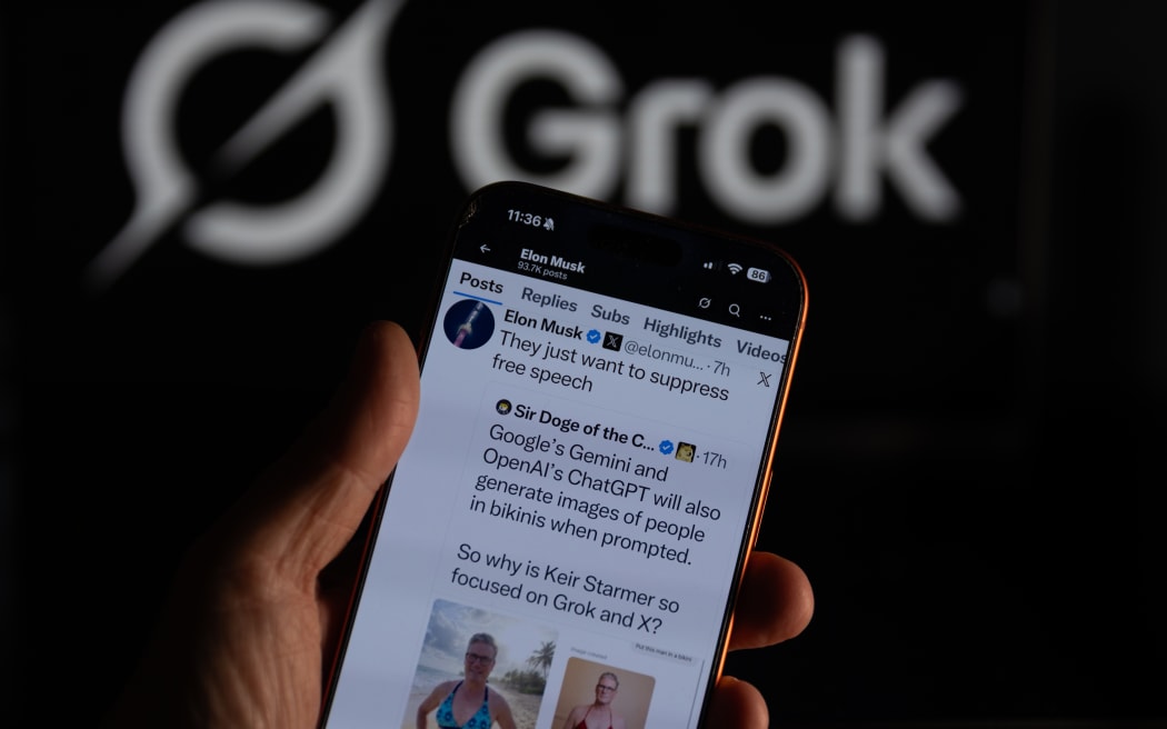 BATH, UNITED KINGDOM - JANUARY 11: In this photo illustration a iPhone screen displays Elon Musk's repost on his social media platform X regarding criticism from British Prime Minister Kier Starmer about his AI tool Grok, on January 11, 2026 in Bath, England. Elon Musk's company xAI has been widely criticised following reports that its AI tool Grok has been used to make sexualised images of children and undress women.
(Photo by Anna Barclay/Getty Images)