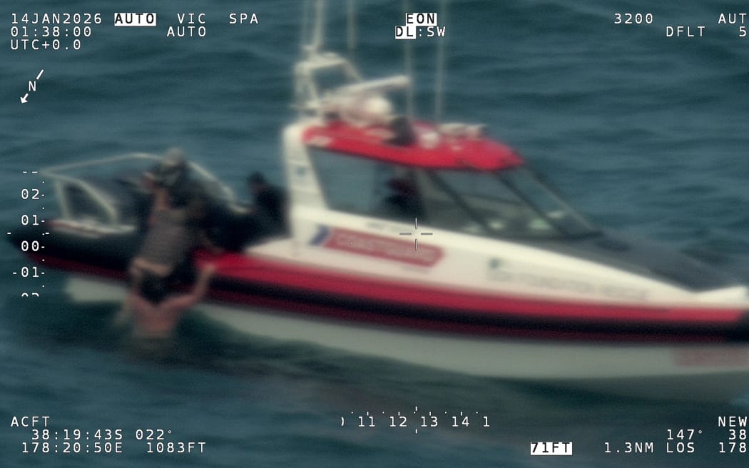 Three men spent six hours in the water off Tolaga Bay before a major search and rescue effort reached them.