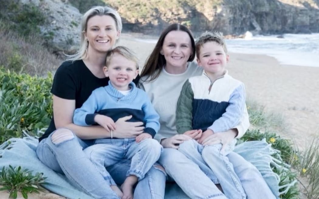 Australian police officer, Inspector Amy Scott with her family.