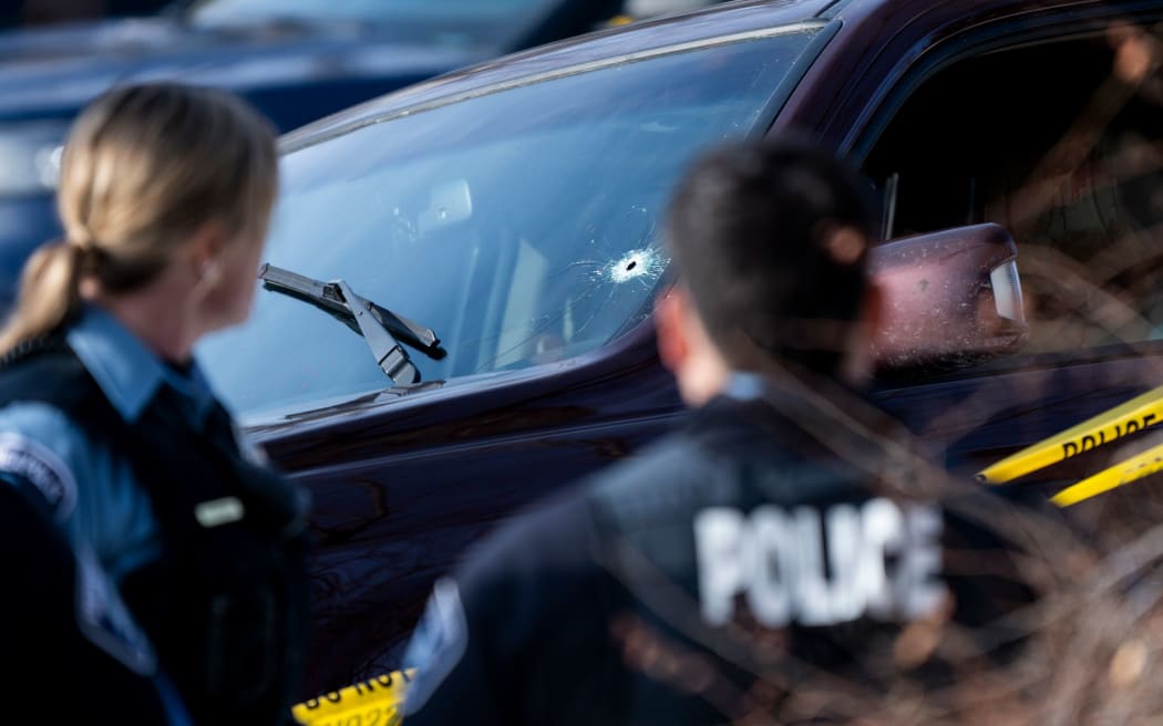 A bullet hole is seen in the windshield of a vehicle involved in a shooting by an ICE agent during federal law enforcement operations on January 07, in Minneapolis, Minnesota.