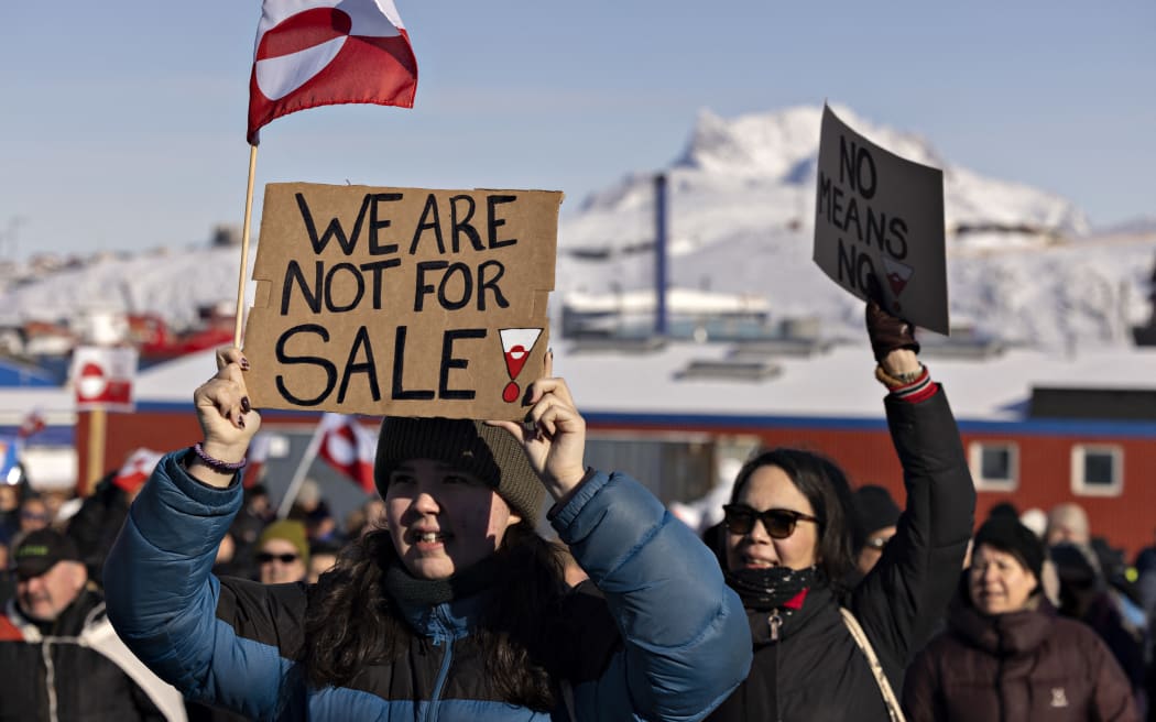 Protest demonstration at the USA's consulate in Greenland. Under the slogan, Greenland belongs to the Greenlandic people. The protest demonstration, under the slogan, Greenland belongs to the Greenlandic people at the USA's consulate in Nuuk in Greenland on Saturday, March 15, 2025. (Photo: Christian Klindt Sölbeck/Scanpix 2025) (Photo by Christian Klindt Soelbeck / Ritzau Scanpix via AFP)
