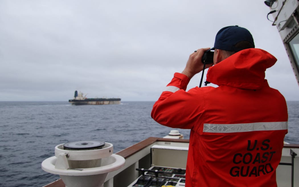 This undated handout photo released on January 7, 2026, by the US European Command's X account shows what US European Command says is the seizure of the M/V Bella 1 oil tanker in the northern Atlantic Ocean.