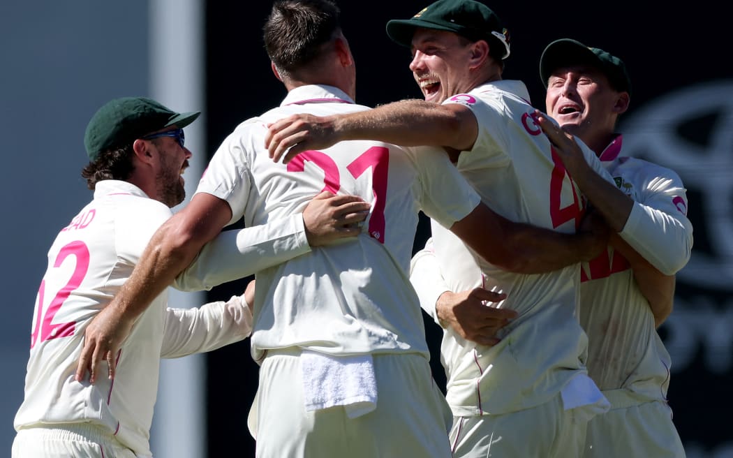 Australia’s Beau Webster (2nd L) celebrates with teammates after dismissing England’s Will Jacks on day four of the fifth Ashes cricket Test match between Australia and England at the SCG in Sydney on January 7, 2026. (Photo by DAVID GRAY / AFP) / -- IMAGE RESTRICTED TO EDITORIAL USE - STRICTLY NO COMMERCIAL USE --