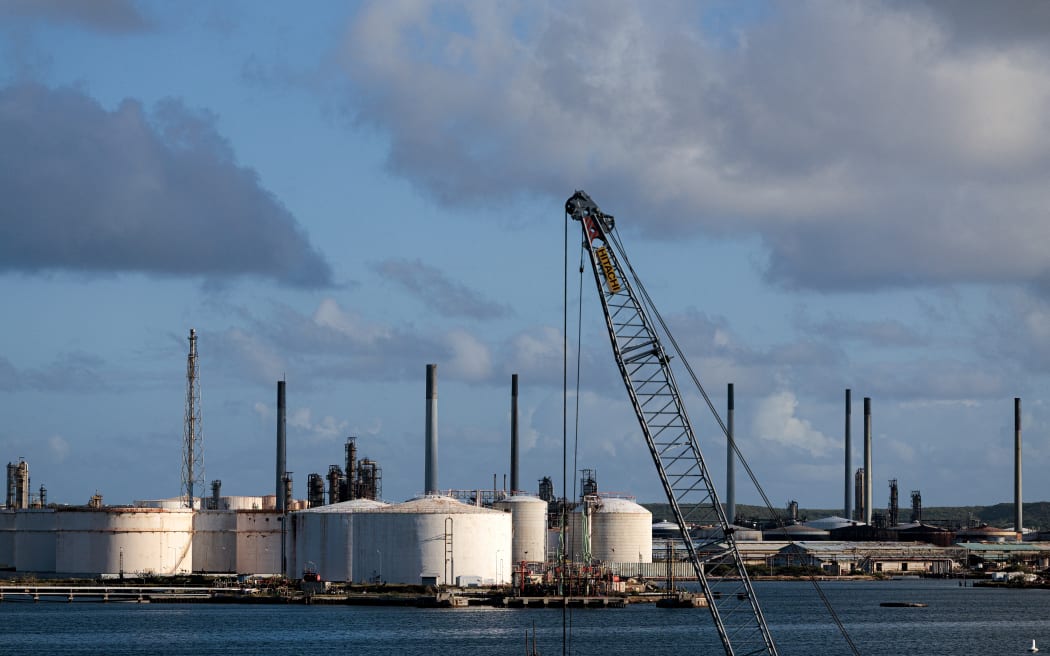 WILLEMSTAD - The Isla refinery on the Isla Peninsula in Willemstad. Curaçao is facing military tensions between the US and Venezuela and recently experienced two near-collisions in airspace. ANP RAMON VAN FLYMEN netherlands out - belgium out (Photo by Ramon van Flymen / ANP MAG / ANP via AFP)