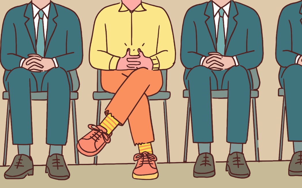 An illustration of several people sitting down in suits with one in the middle wearing bright-coloured clothing.