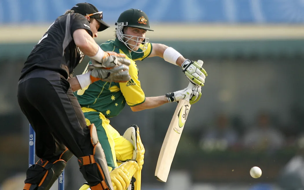 Australian cricketer Damien Martyn (R) plays a stroke past New Zealand wicketkeeper Brendon McCullum during the first semi-final for The ICC Champions Trophy 2006 between New Zealand and Australia at The Punjab Cricket Association (PCA) Stadium in Mohali, 01 November 2006.  Australia are 88 runs for the loss of three wickets in 23 overs after New Zealand cricket captain Stephen Fleming won the toss and elected to field   AFP PHOTO/Deshakalyan CHOWDHURY (Photo by DESHAKALYAN CHOWDHURY / AFP)