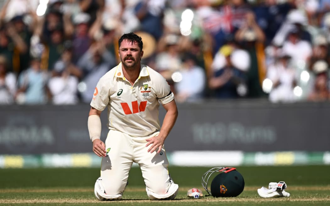 Travis Head of Australia celebrates scoring a century during the third Ashes Test, Adelaide, 2025.