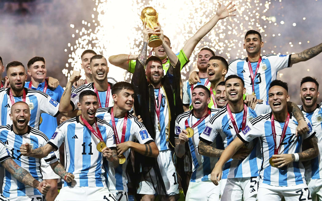 Lionel Messi and Argentina team-mates celebrate winning the 2022 FIFA World Cup.
